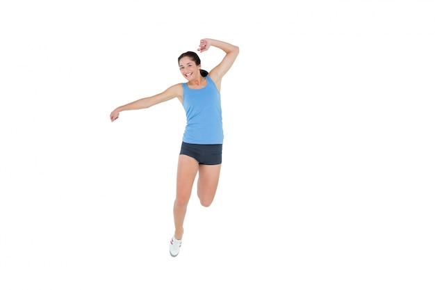 Sctive sporty woman rejocing over white background 