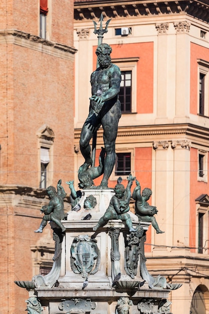 Sculpture on fouintain in Bologna in sunny day