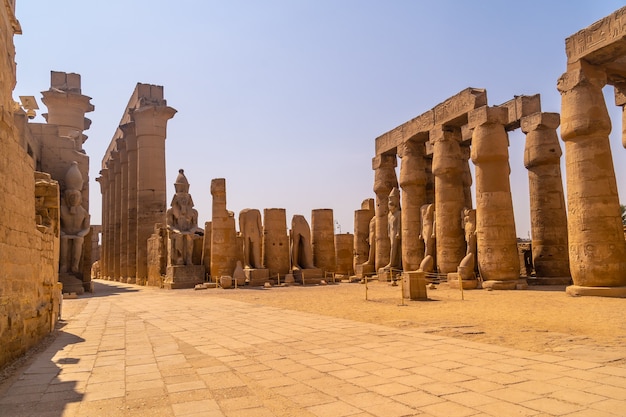 The sculptures of pharaohs and ancient Egyptian drawings on the columns of the Luxor Temple