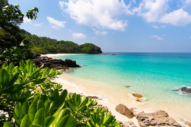 Sea beach sand mountain blue sky background