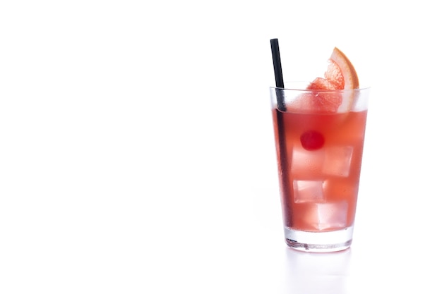 Sea breeze cocktail in glass on wooden table