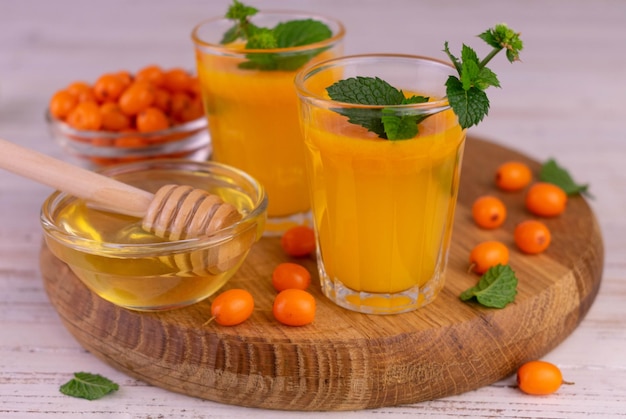 Sea buckthorn juice with honey and mint.