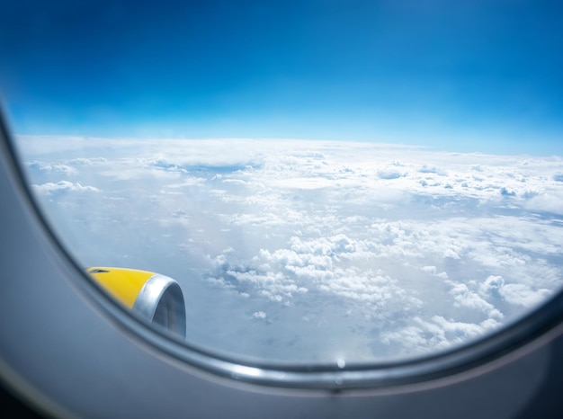 Sea of clouds view from an airplane window