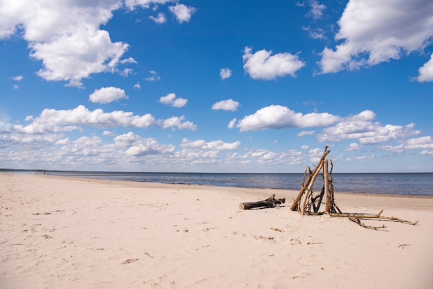 Sea coast with clouds in sunny summer day.