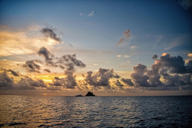 Sea or ocean horizon with blue water in evening France on cloudy sky background. Summer vacation and travelling concept