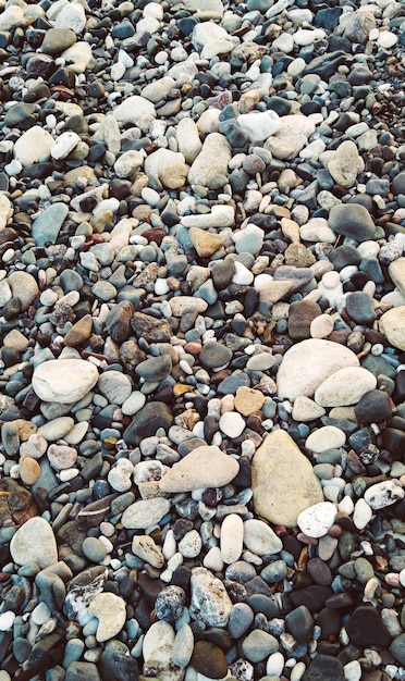 Sea pebble colorful wet background vintage hipster image