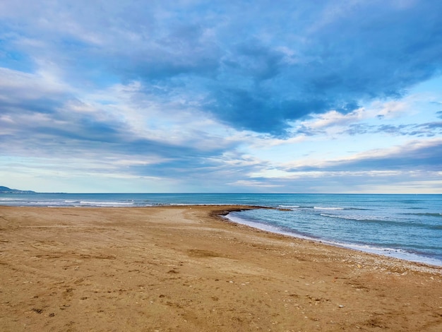 Sea shore beach Blue wave and cloud on landscape Beautiful coastline on summer vacation