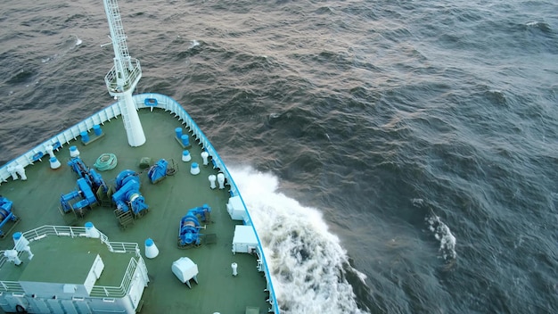 Sea storm waves break on the bow of the ship. Coast Guard during a storm in the ocean.