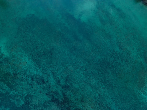 Sea surface aerial viewBird eye view photo of blue waves and water surface texture Blue sea background Beautiful nature Amazing view sea backgroundx9