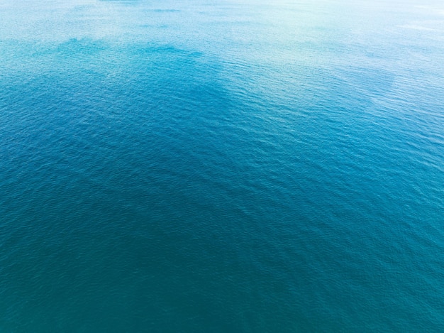 Sea surface aerial viewBird eye view photo of blue waves and water surface texture Blue sea background Beautiful nature Amazing view sea backgroundx9