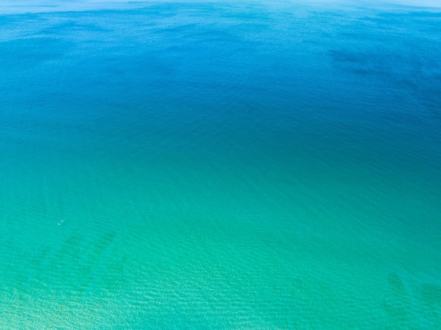 Sea surface aerial viewBird eye view photo of blue waves and water surface texture Blue sea background Beautiful nature Amazing view sea backgroundx9