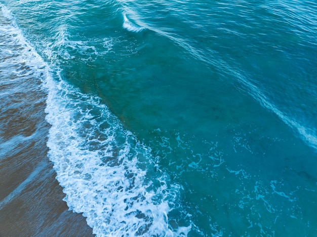 Sea surface aerial viewBird eye view photo of waves and water surface textureTurquoise sea background Beautiful nature Amazing view sea background