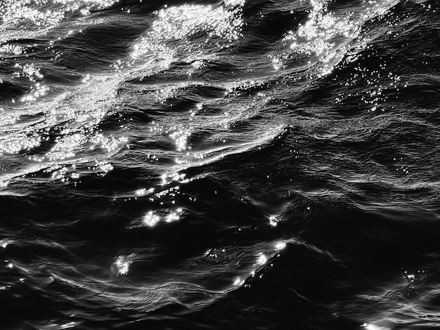 Sea texture and coastal nature concept ocean water as black and white monochrome surface background