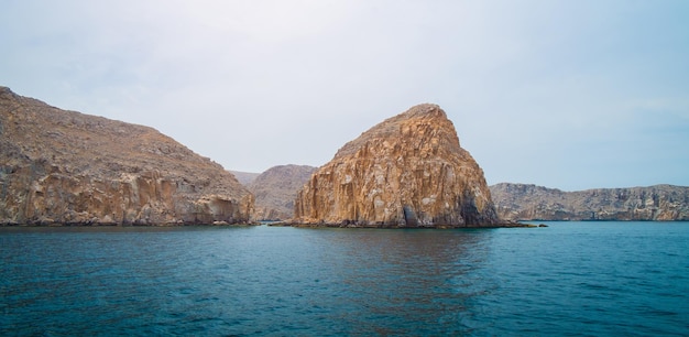 Sea tropical landscape with mountains and fjords Oman