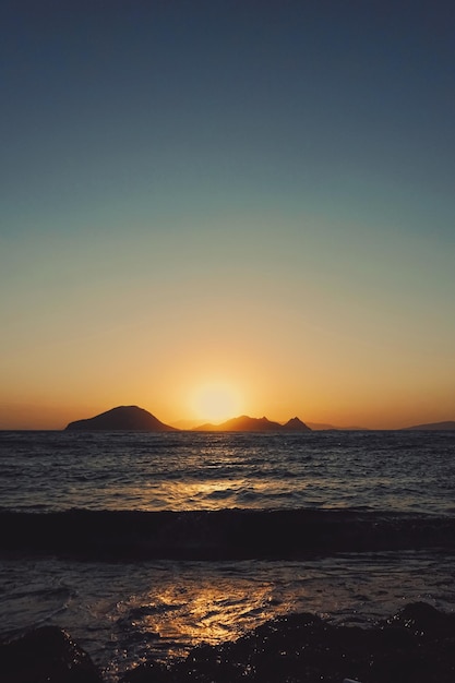 Sea view and mountains in the Mediterranean at sunset summer vacation travel and holiday destination