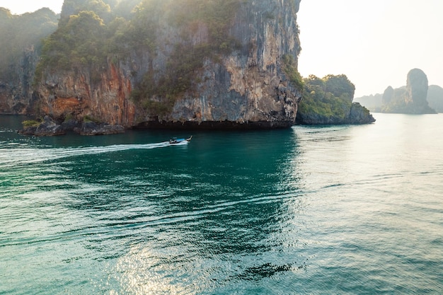 Sea views and rocky islands with a longtail boat