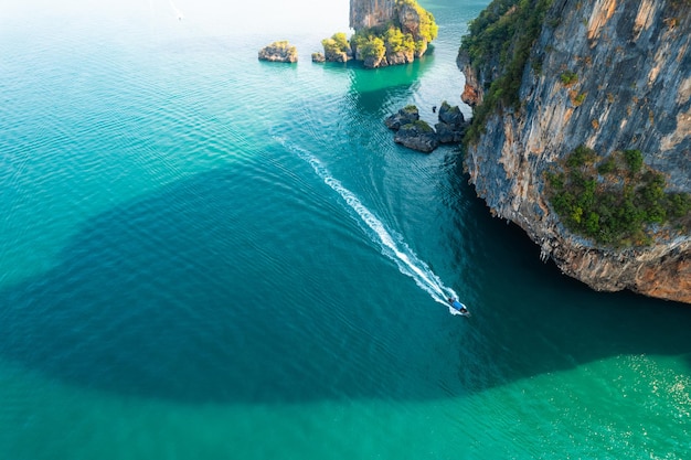 Sea views and rocky islands with a longtail boat