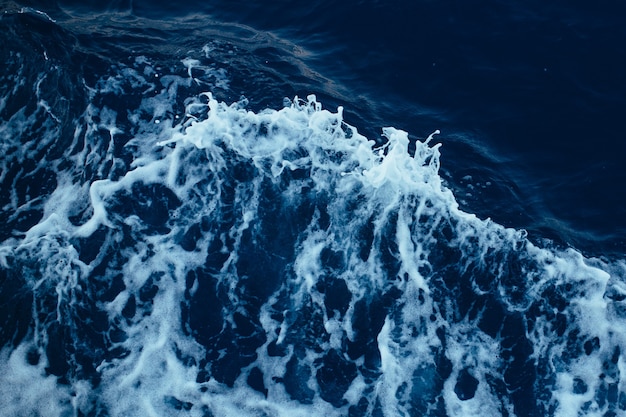 Sea wave swirling from a motor boat