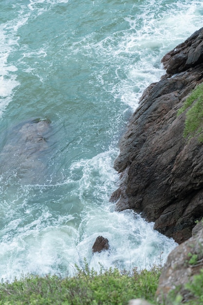 Sea waves crashing against the rocks