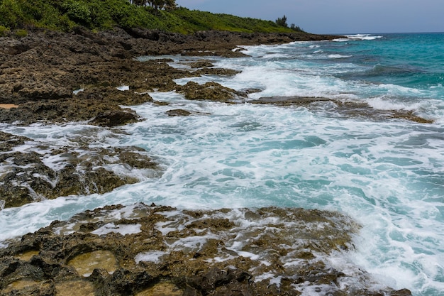 Sea waves and rock