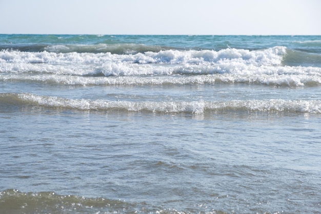 Sea waves run on the shore of the sea or ocean