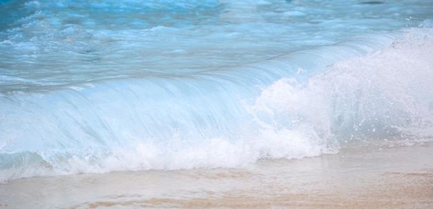 Sea waves on a sandy beach