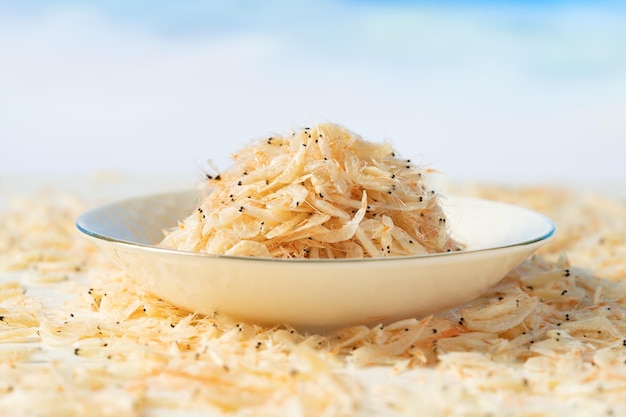 Seafood condiment dried shrimp skin on solid color background