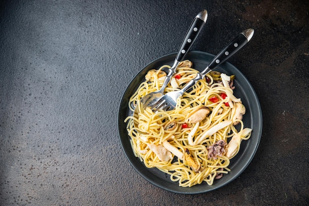 Seafood pasta spaghetti second course Italian food healthy meal snack on the table copy space food