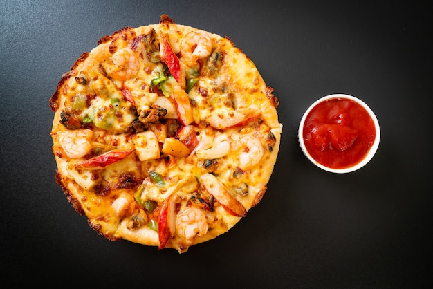 Seafood pizza isolated on white background