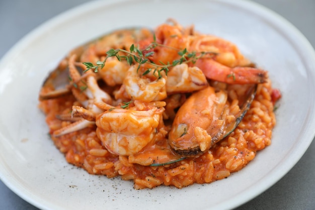 Seafood risotto with mussel shrimp and squid , italian food