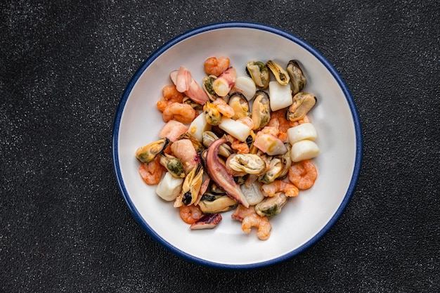 seafood salad shrimp mussel scallop octopus healthy meal food snack on the table copy space