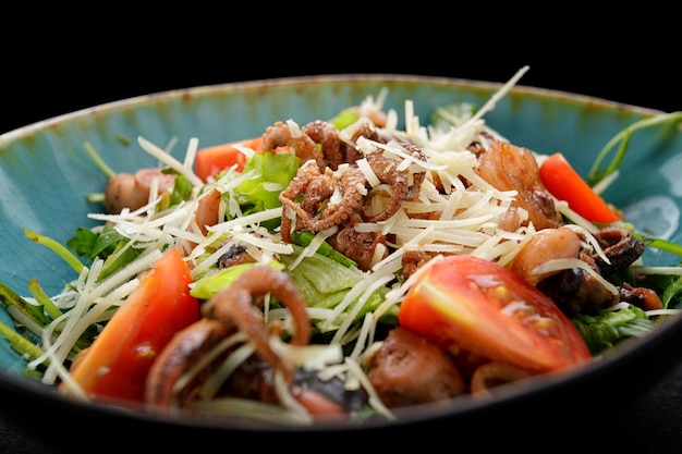 Seafood salad with cheese greens and tomatoes