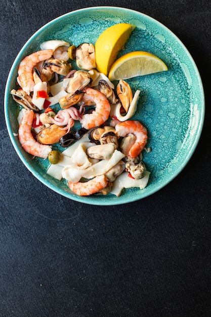 Seafood salad with shrimp, mussels, and squid