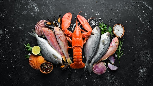 Seafood on stone background Lobster fish shellfish Top view Free copy space