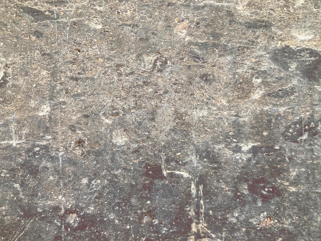 Photo seamless basalt texture with damage and dirt