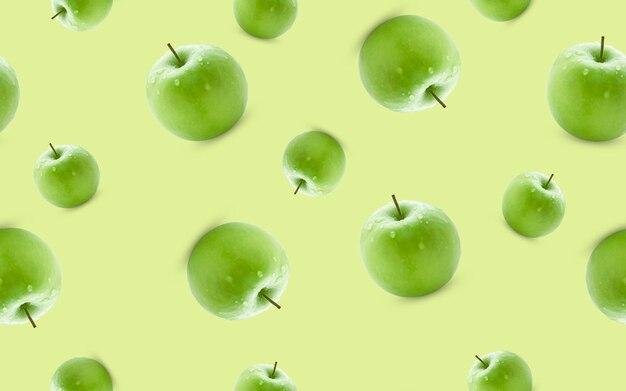 Seamless pattern from green apples on a yellow background