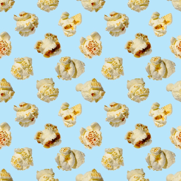 Seamless pattern popcorn popcorn on a blue background pattern