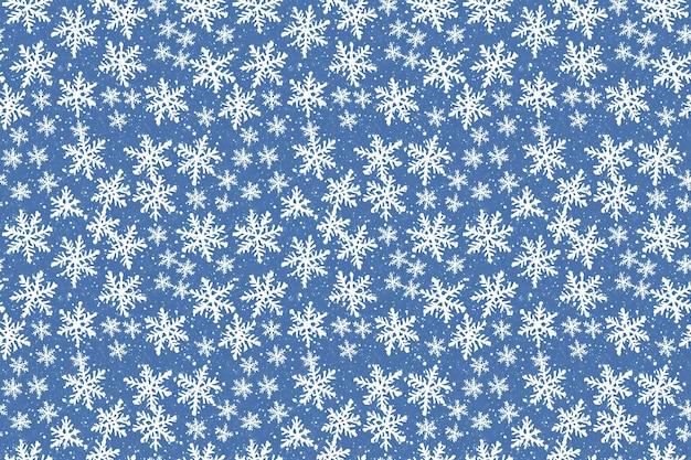 A seamless pattern of white snowflakes on a blue background.