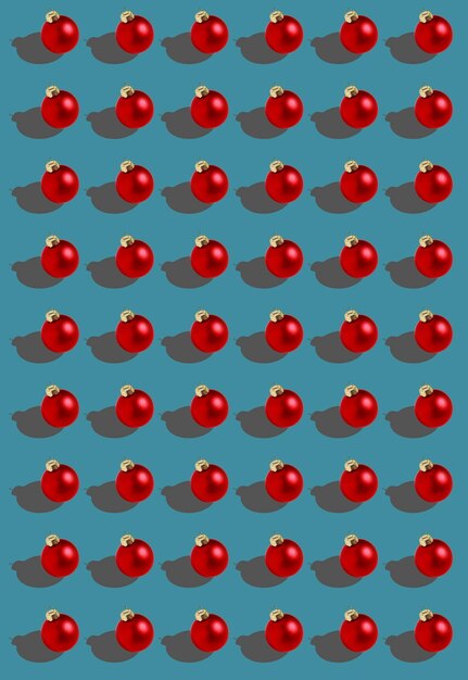 seamless red Christmas balls pattern on blue background