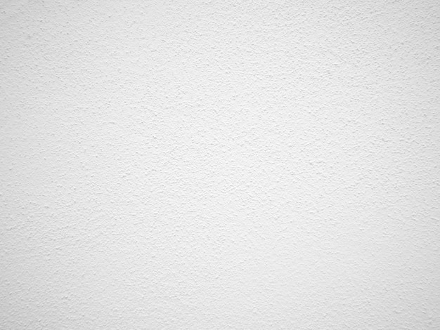 Seamless texture of white cement wall a rough surface with space for text for a background