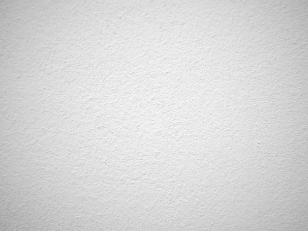 Seamless texture of white cement wall a rough surface with space for text for a background