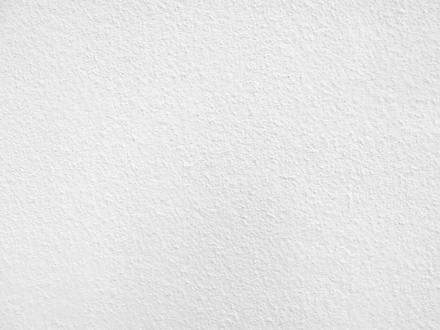 Seamless texture of white cement wall a rough surface with space for text for a background