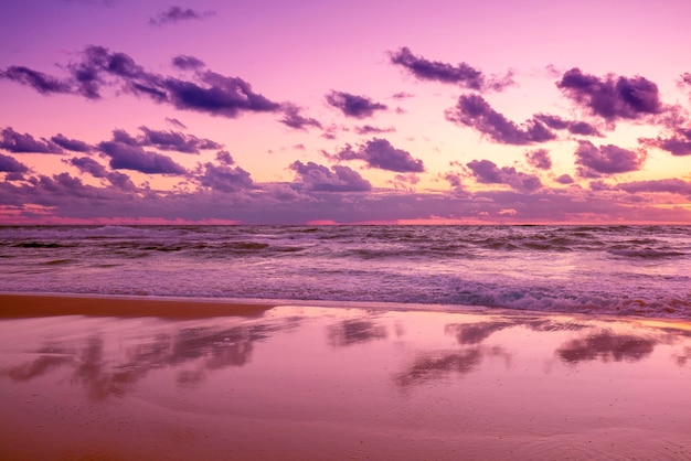 Seascape in the early morning Purple sunrise over the sea