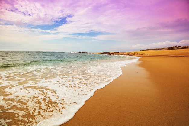 Seascape in the evening Deserted beach Sandy seashore with beautiful sky