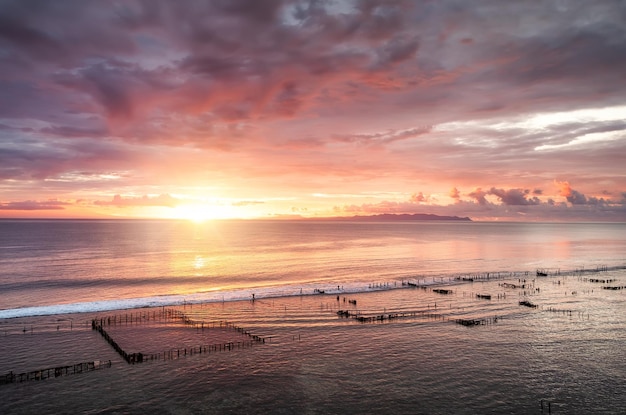 Seascape during the sunrise Sky and reflections on the water in the summer Sun rays during the sunrise Nusa Penida Bali Indonesia Travel image