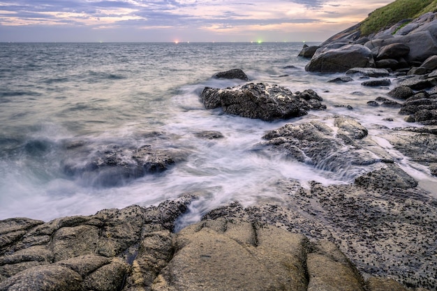 Seascape of wave hitting on coastline