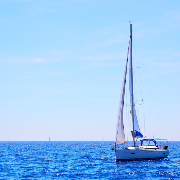 Seascape with sea horizon and yacht. Copyspace composition