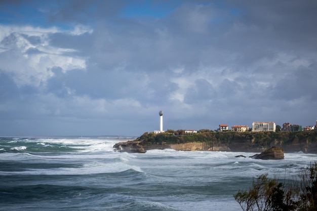 Seaside and beach of the city of Biarritz during a storm panoramic landscape