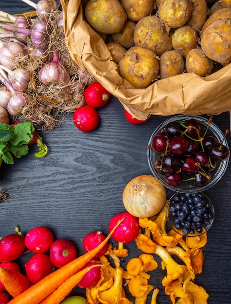 Seasonal vegetables berry mushrooms for healthy cooking Top view flat lay Detox vegan and clean diet eating