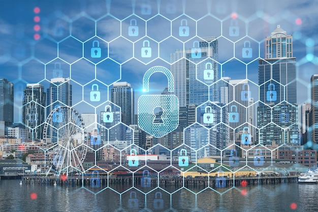 Seattle skyline with waterfront view Skyscrapers of financial downtown at day time Washington USA The concept of cyber security to protect confidential information padlock hologram